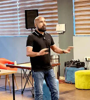 TechWhizz gallery image showing a speaker presenting in front of an audience
